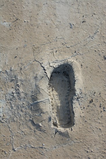 Footstep pattern seen on a concrete background