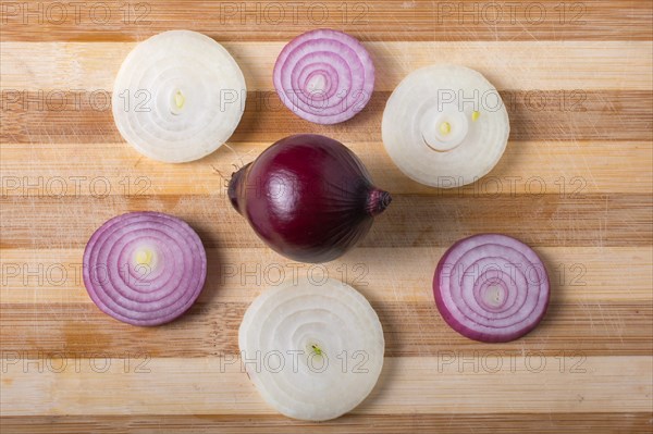 Sliced onion rings and onion slices on the background