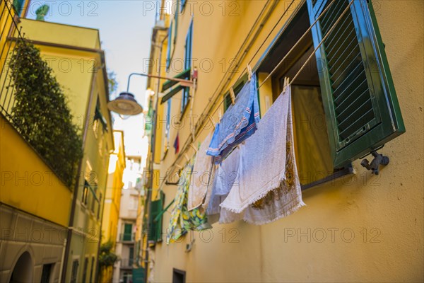 Beautiful Window and a Clothes Hanger with Clothes in City in Genoa