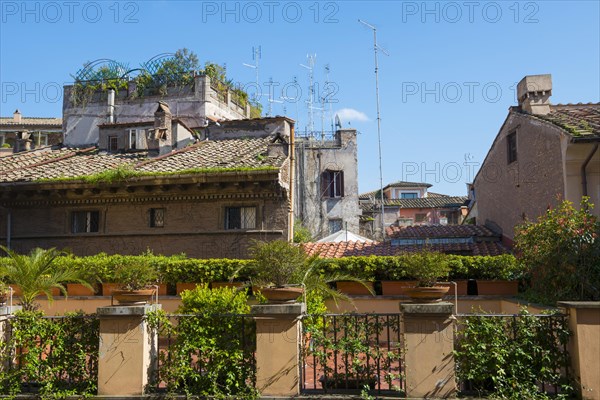 TV Antennas on the Roofs of the Old Town of Rome in a Sunny Day in Lazio