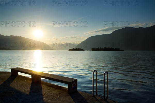 Sunrise over an Alpine Lake Maggiore with Brissago Islands and Mountain in Ticino