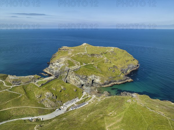 Aerial view of the rugged coastline on the Celtic Sea with the Tintagel Peninsula and the ruins of Tintagel Castle