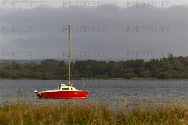 Sailing boat with strong red colour