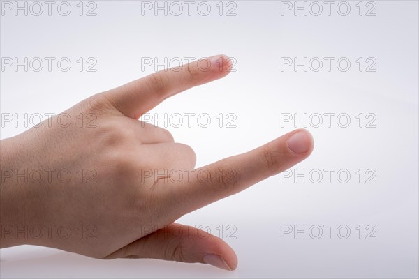Hand of a rocker on a white background