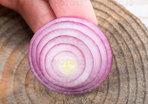 Sliced onion rings and onion slices on the background