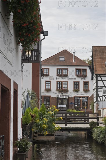 Old town of Annweiler with the small river Queich