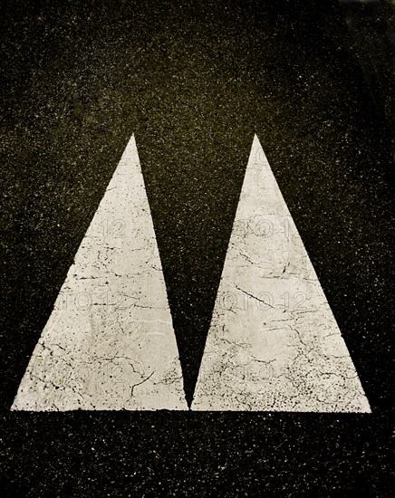 Direction arrows on macadam