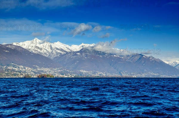 Alpine Lake Maggiore with Brissago Islands and Snow-capped Mountain in Ticino