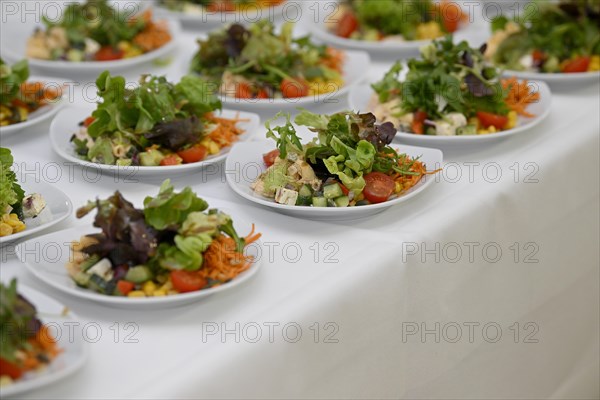 Several mixed salad plates
