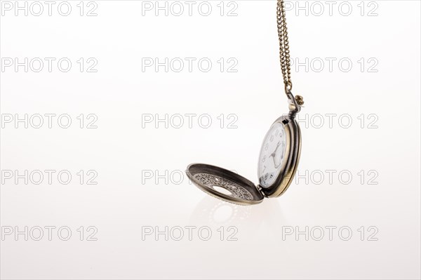 Isolated retro styled pocket watch on white background