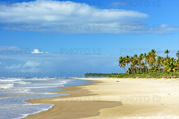 Sunny summer day on the idyllic beach of Sargi in Serra Grande in Bahia