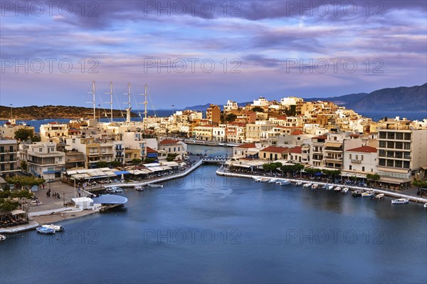 Colorful view of Voulismeni lake and Agios Nikolaos town on Crete island