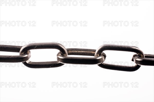 Metal chain on white background