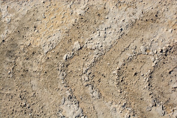 Tire tracks tire marks on Concrete as abstract grunge texture