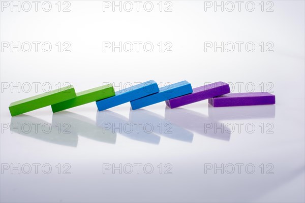 Colorful Domino Blocks placed on a white background