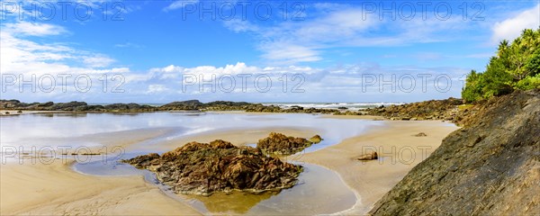 Panoramic image of beautiful Prainha beach located in Serra Grande in Bahia and surrounded by rocks and vegetation