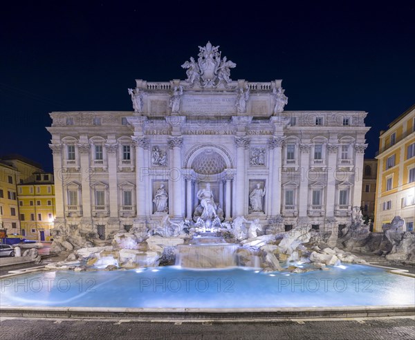 Trevi Fountain at Night in City Square in Rome