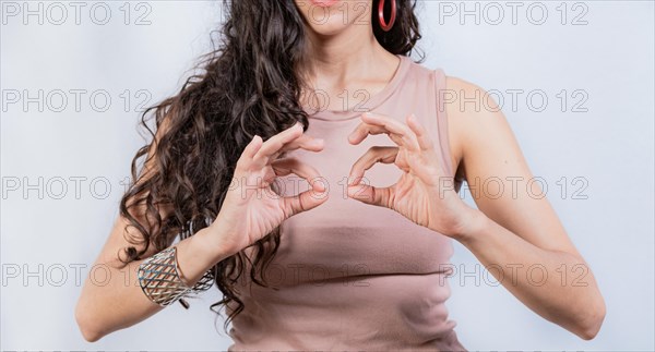 Interpreter gesturing in sign language. People gesturing in sign language isolated. Unrecognizable woman gesturing in sign language