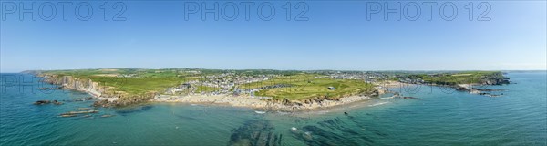 Aerial panorama of the coastline of Bude Bay with bathing beaches Crooklets Beach