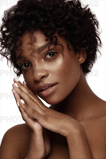 African American skincare models with perfect skin and curly hair. Beauty spa treatment concept