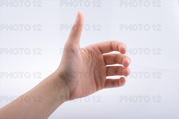 Hand holding on a white background