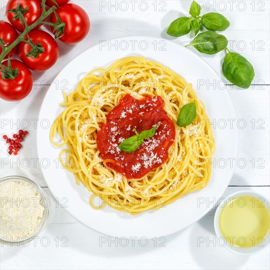 Spaghetti eat Italian pasta lunch dish with tomato sauce from above square in Stuttgart