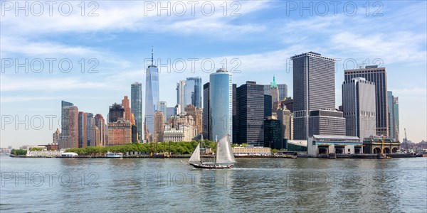 New York City skyline of Manhattan with World Trade Center skyscraper and sailing ship panorama in New York