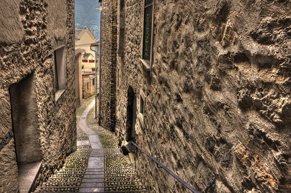 Narrow Street with Cobblestone and Old Rustic House in Ronco sopra Ascona in Ticino