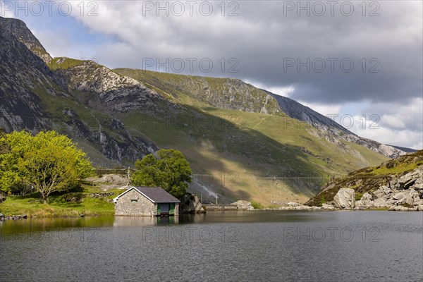 View over the lake with boathouse