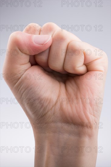 Clenched fist on a white background