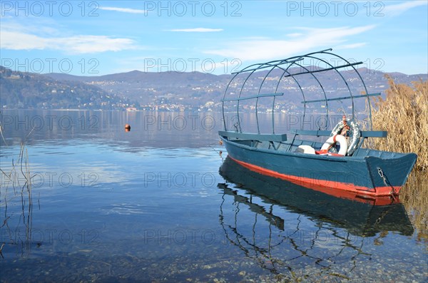 Old Fishing Boat on an Alpine Lake Maggiore in Piedmont