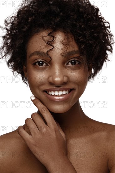 African American skincare models with perfect skin and curly hair. Beauty spa treatment concept