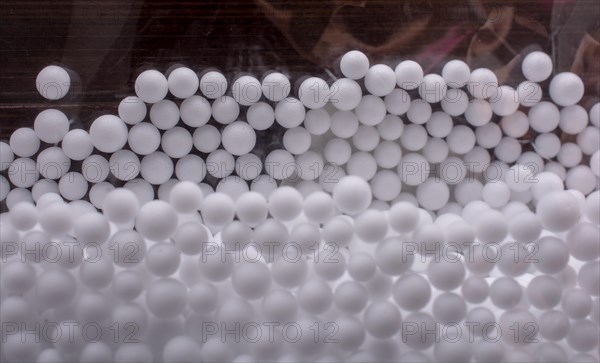 White little polystyrene foam balls as background