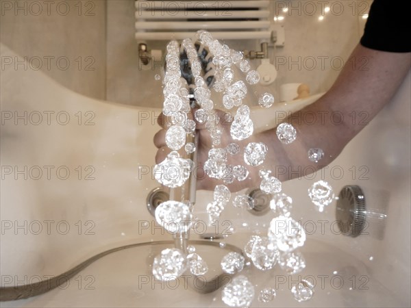 Close up on a Shower Head with Water Drops