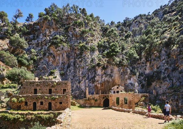 Ruins of remote abandoned Orthodox Katholiko monastery and bridge over Avlaki gorge near Gouverneto moni