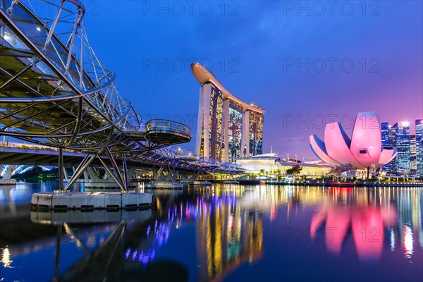 Marina Bay Skyline and Helix Bridge in the evening in Singapore