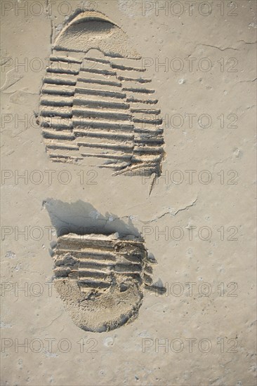 Footstep pattern seen on a concrete background