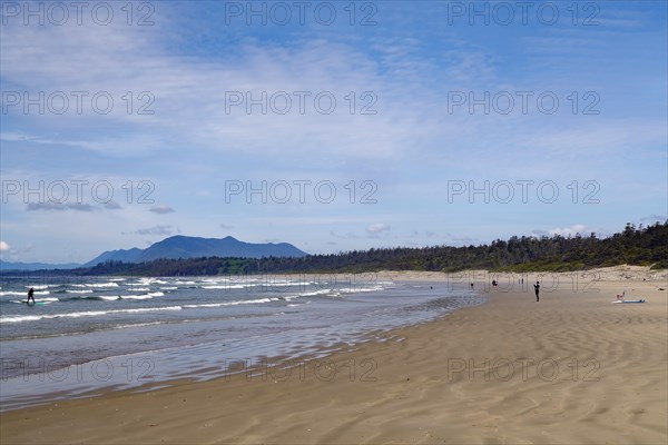 Long sandy beach with few people