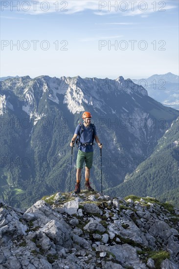 Mountaineer on a ridge path