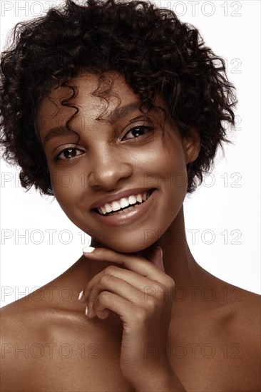 African American skincare models with perfect skin and curly hair. Beauty spa treatment concept