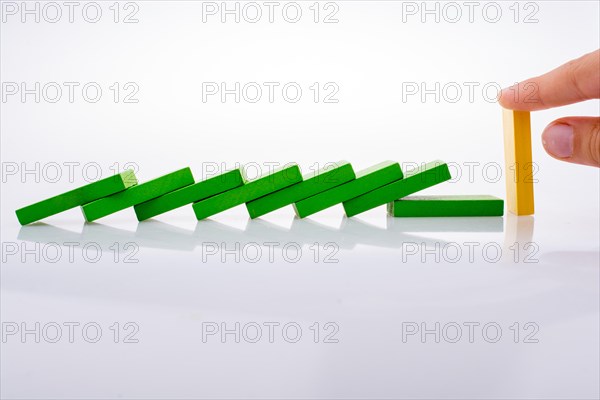 Colorful Domino Blocks in a line on a white background