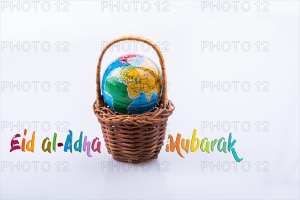 Little model globe in a basket in view