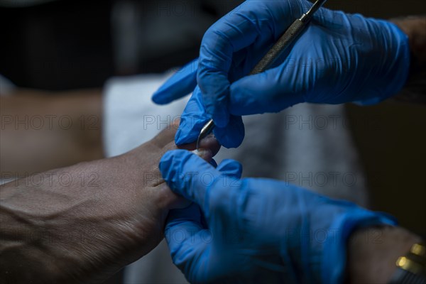 Woman Making Pedicure on Her Foot in Switzerland