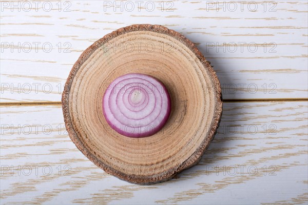 Sliced onion rings and onion slices on the background