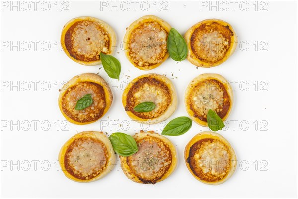 Nine small pizzas Margherita