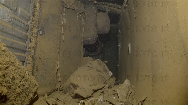 Interior of car lying inside cramped hold of ferry Salem Express shipwreck
