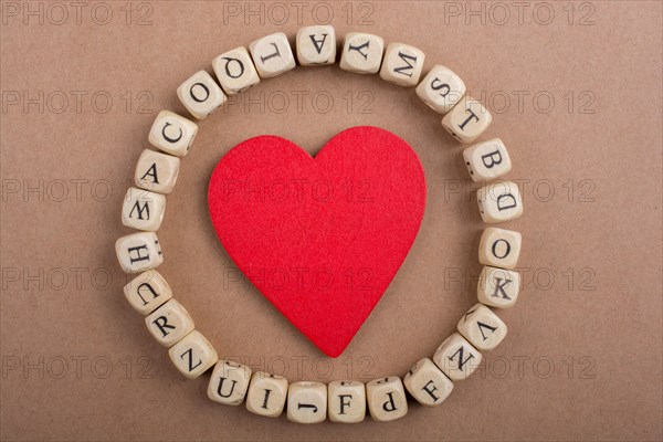 Red Love icon and Letter cubes of made of wood