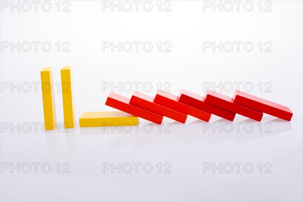 Colorful Domino Blocks in a line on a white background