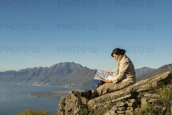 Woman relax on a mountain top