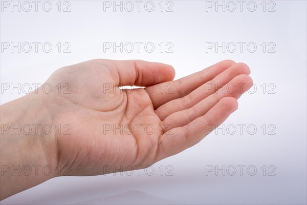 Hand holding on a white background